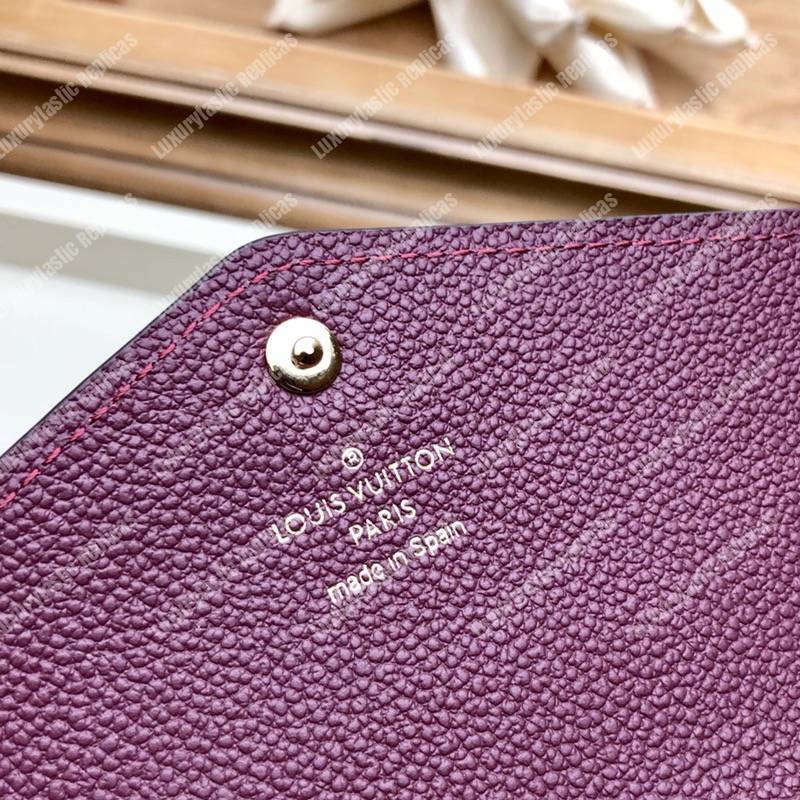LV Sarah Wallet Monogram Empreinte Leather Raisin Purple