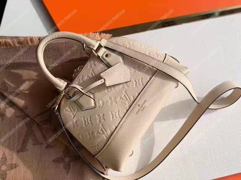 LV Neo Alma PM Monogram Empreinte Creme