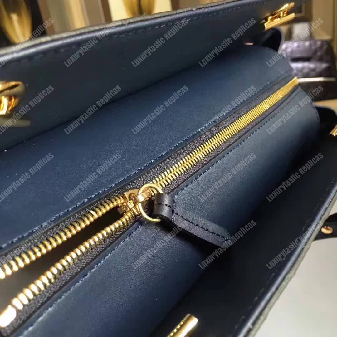 G*u*i signature medium top handle bag blue