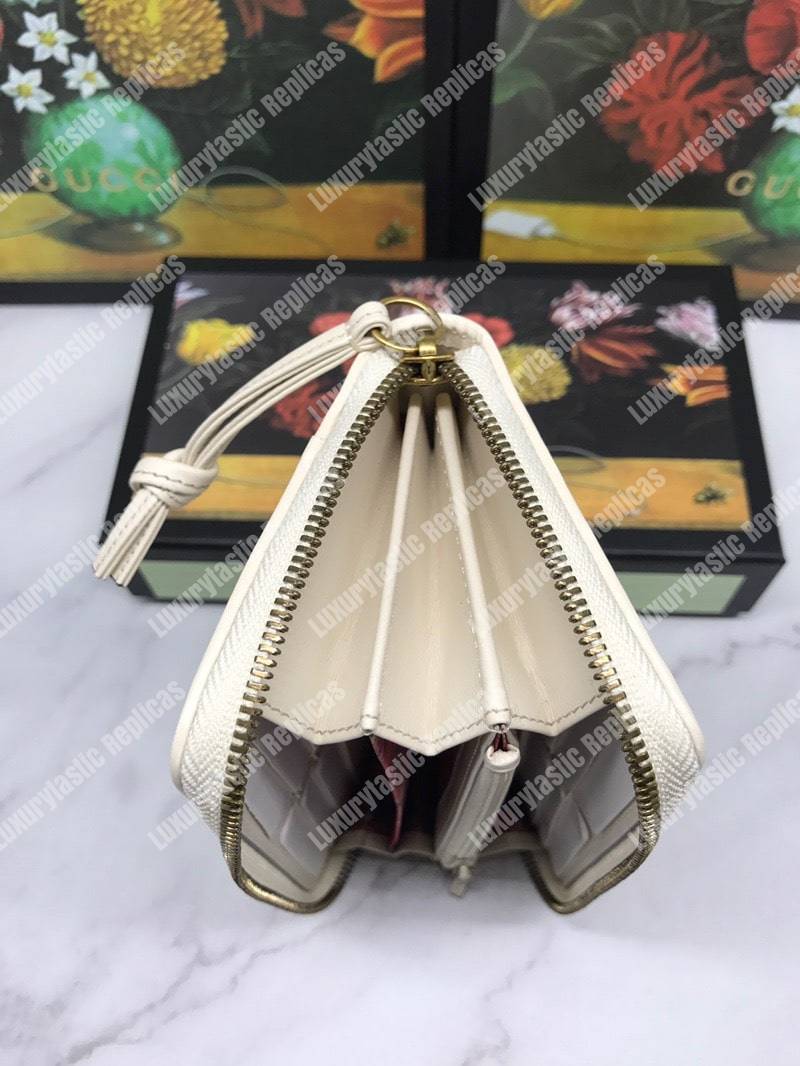 G*u*i leather zip around with double g off-white