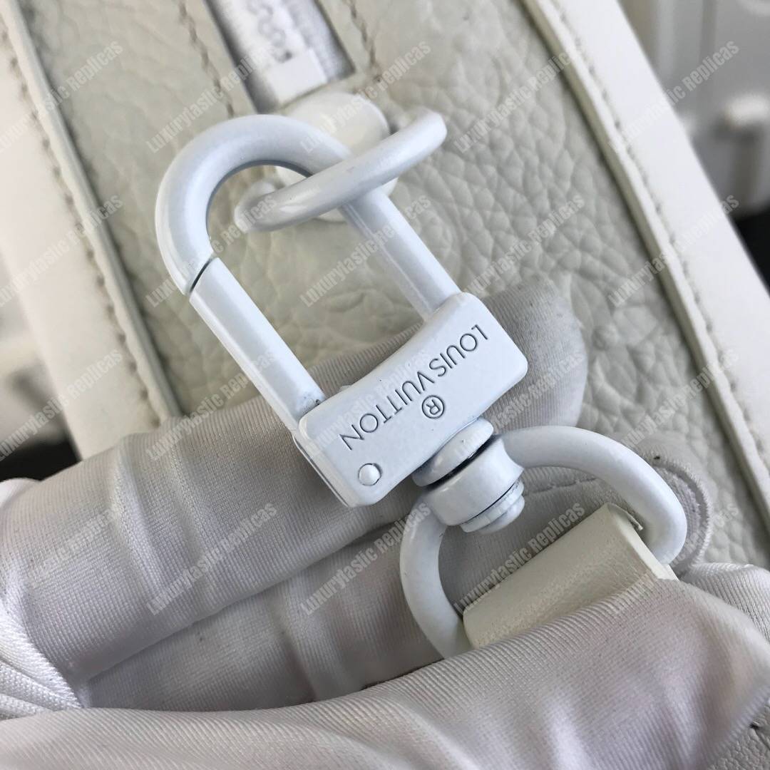 LV Soft Trunk Taurillon Monogram Leather Powder