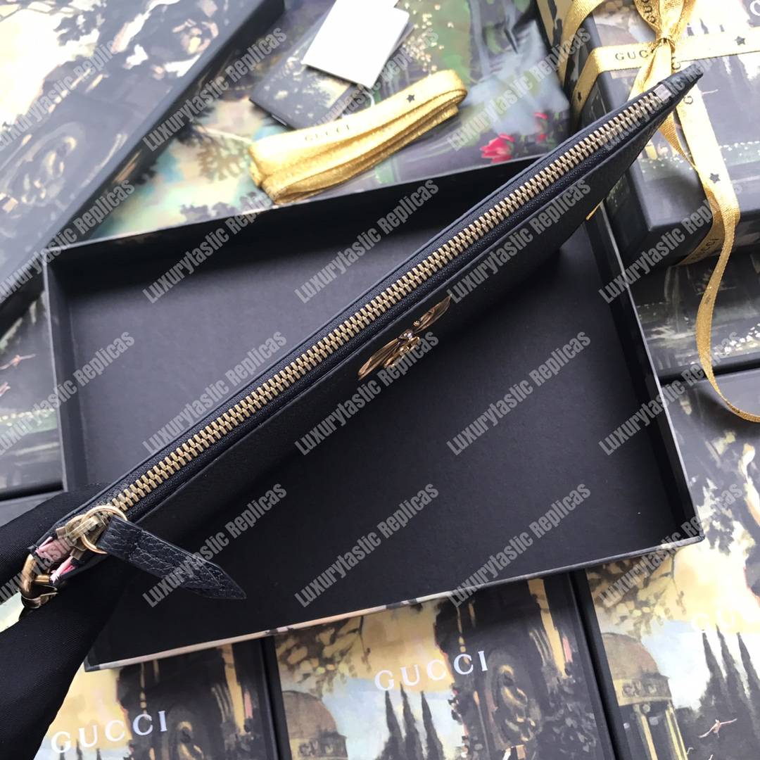 G*u*i leather pouch with bow black