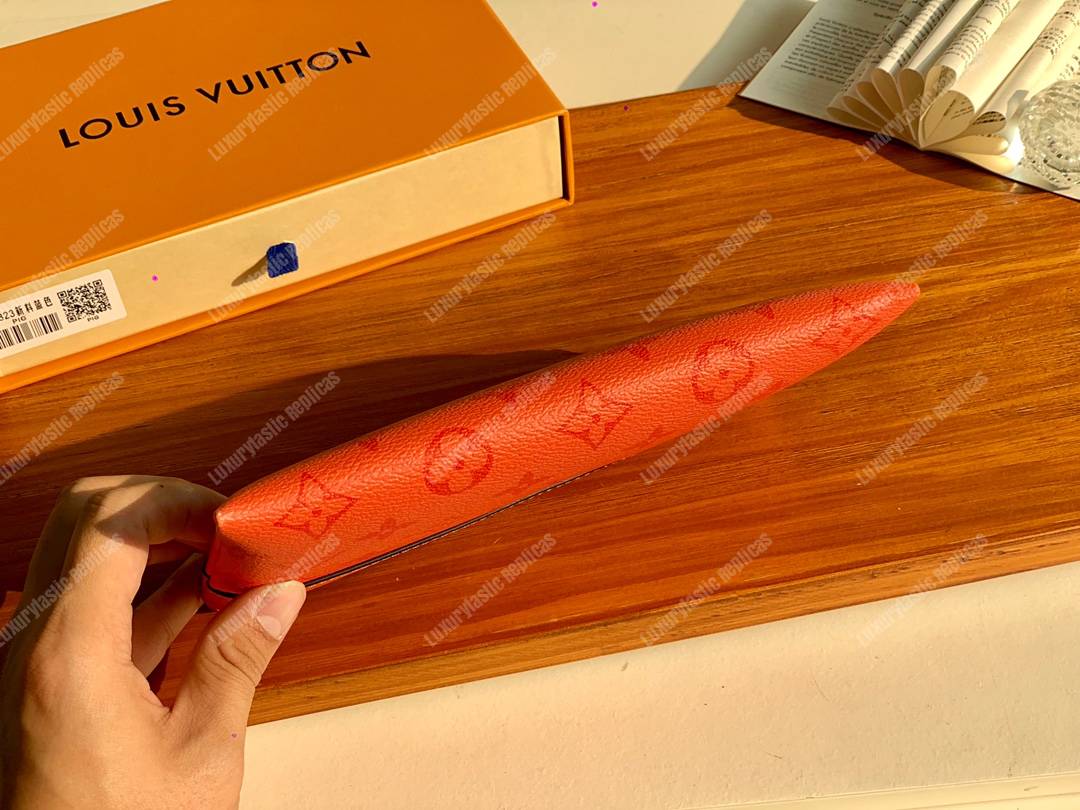 LV Discovery Pochette PM Orange