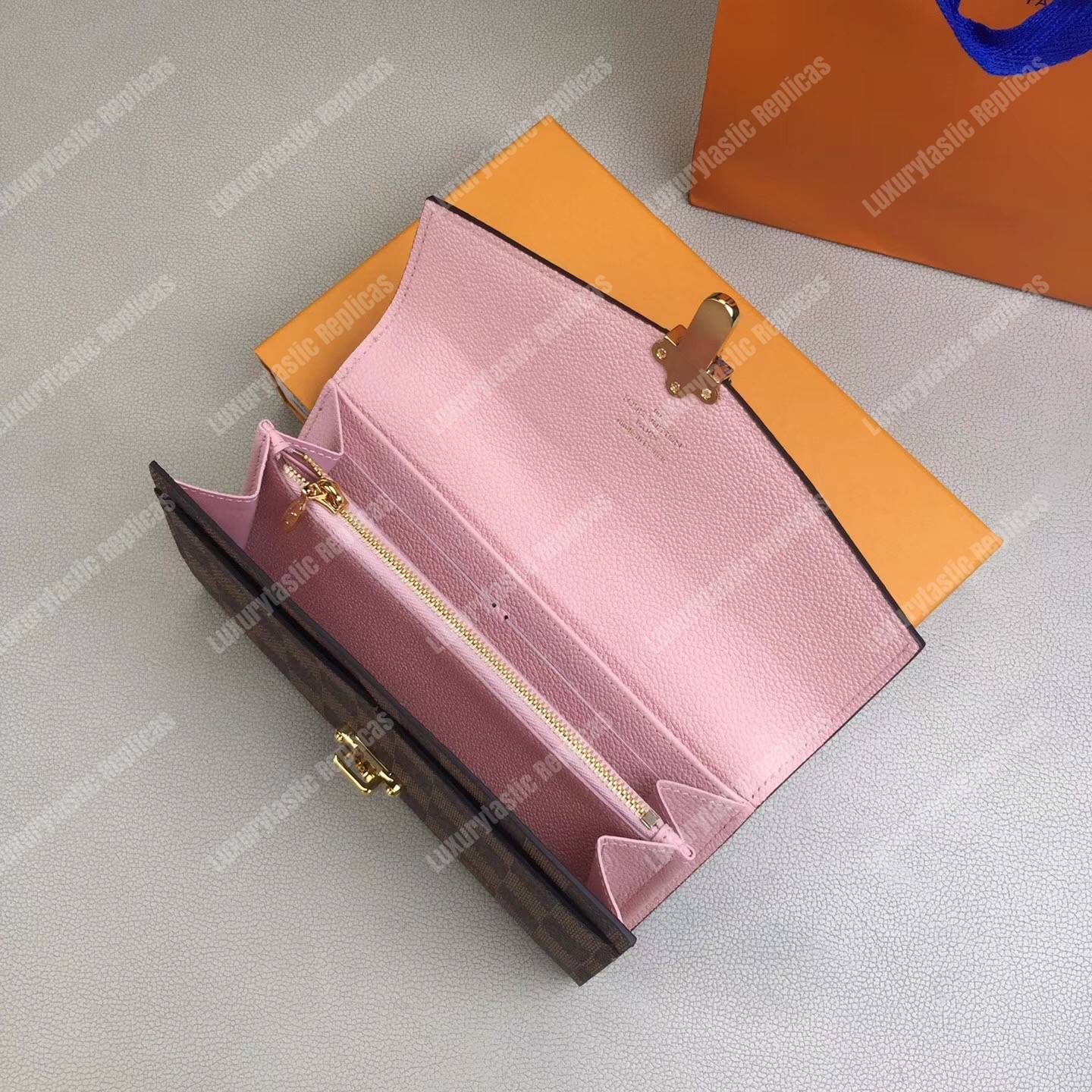 LV Clapton Wallet Damier Ebene Magnolia