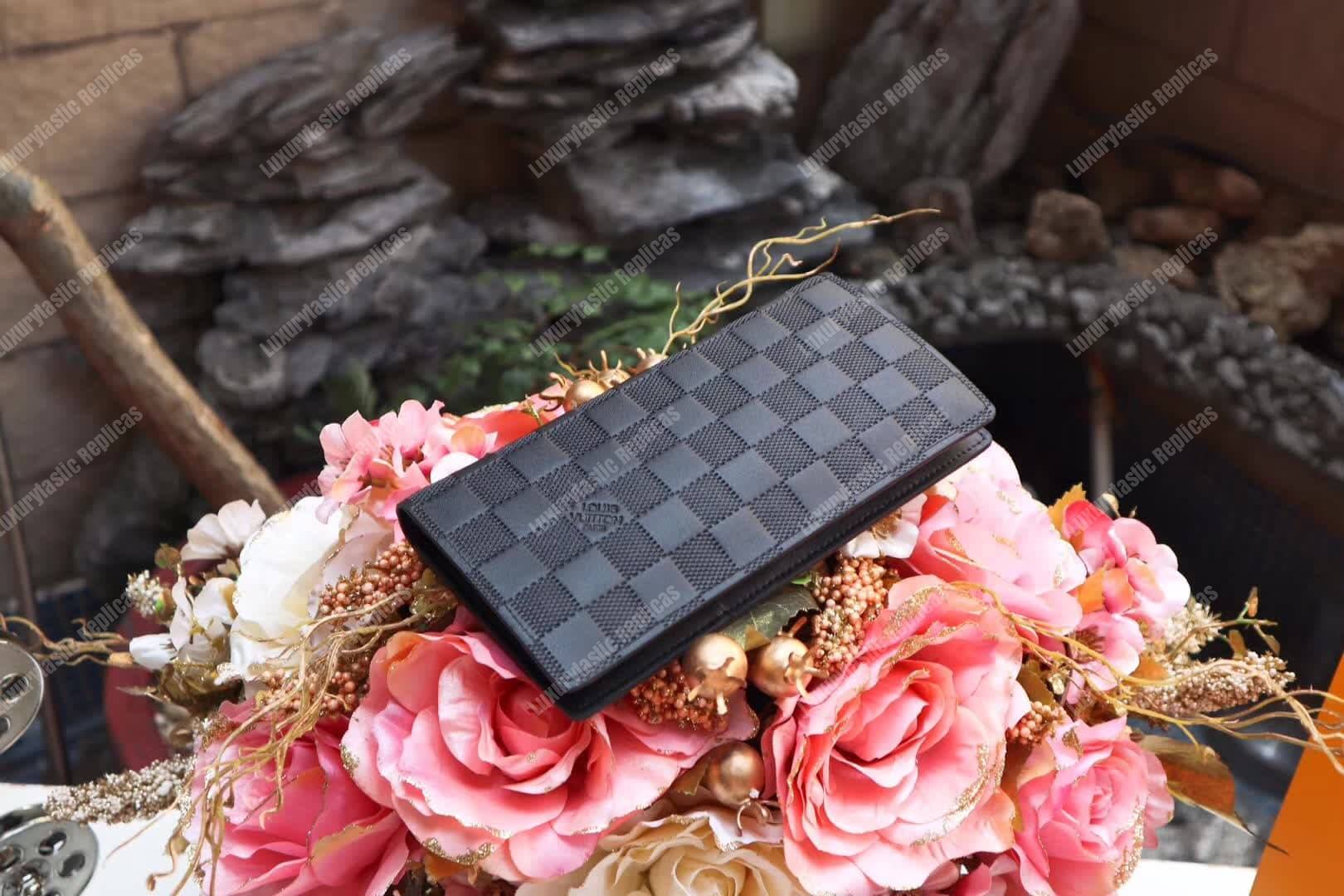 LV Brazza Wallet Vertical Damier Infini Leather Astral