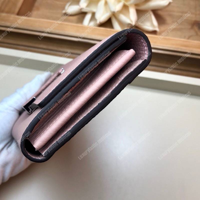 LV Capucines Wallet Taurillon Magnolia