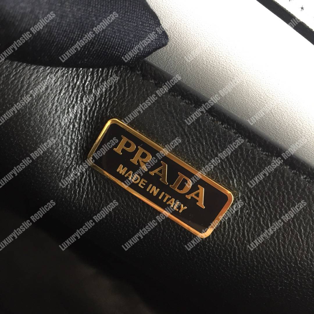 Pra*a cahier leather shoulder bag white