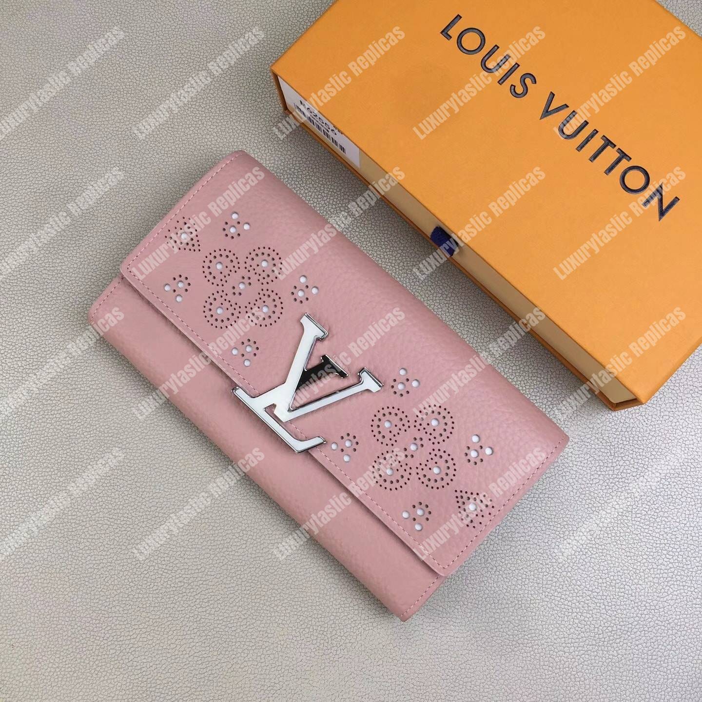 LV Capucines Wallet Magnolia
