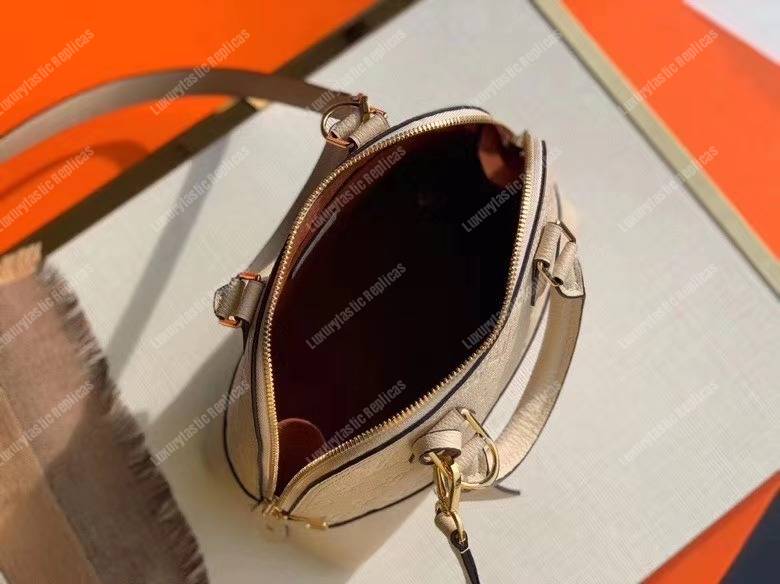 LV Neo Alma PM Monogram Empreinte Creme