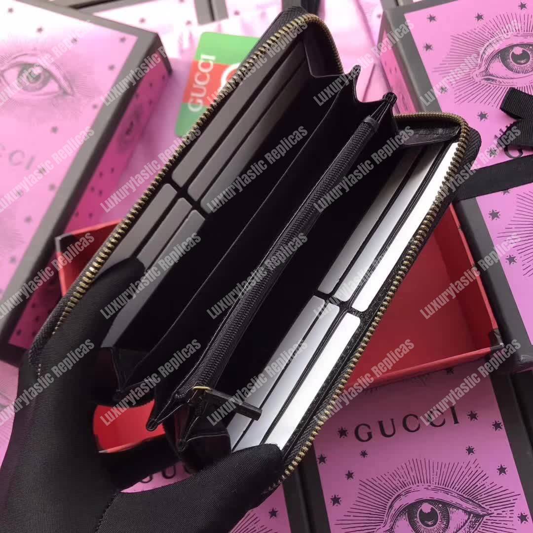 G*u*i leather zip around wallet black