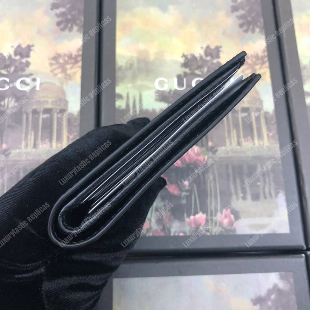 G*u*i blade embroidery wallet