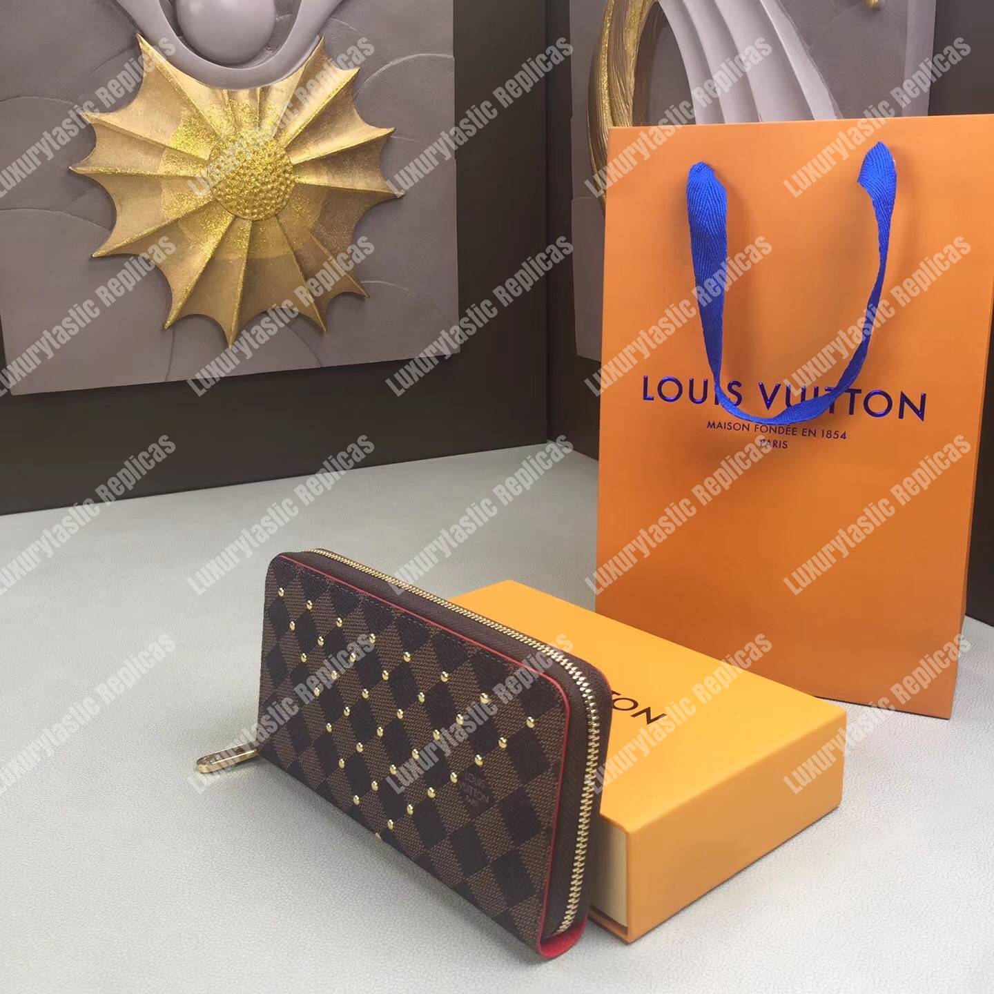 LV Zippy Wallet Damier Ebene Gold Studs