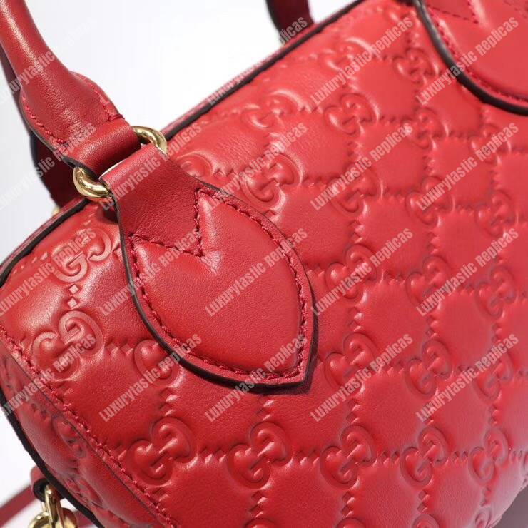 G*u*i signature small top handle bag red