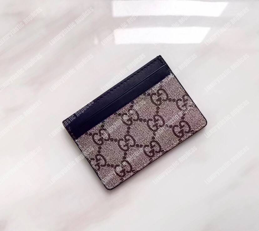 G*u*i tiger print gg sup*e card case