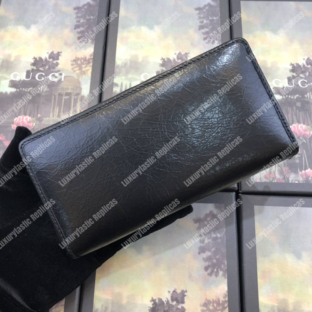 G*u*i zip around wallet with interlocking g