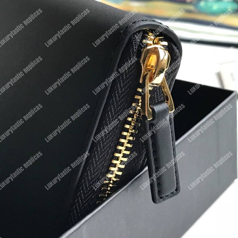 G*u*i leather zip around wallet with G*u*i logo