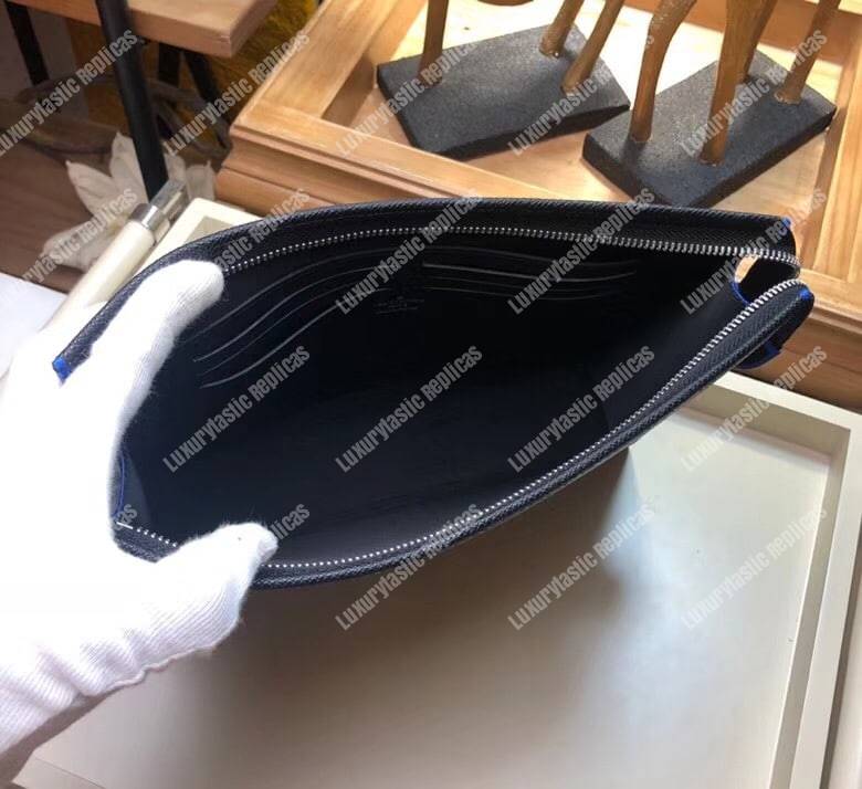 LV Pochette Voyage Taiga Leather
