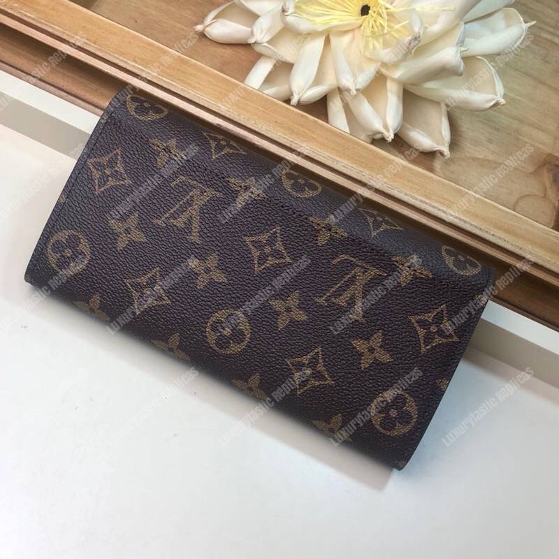LV Sarah Wallet Lion and Cheetah