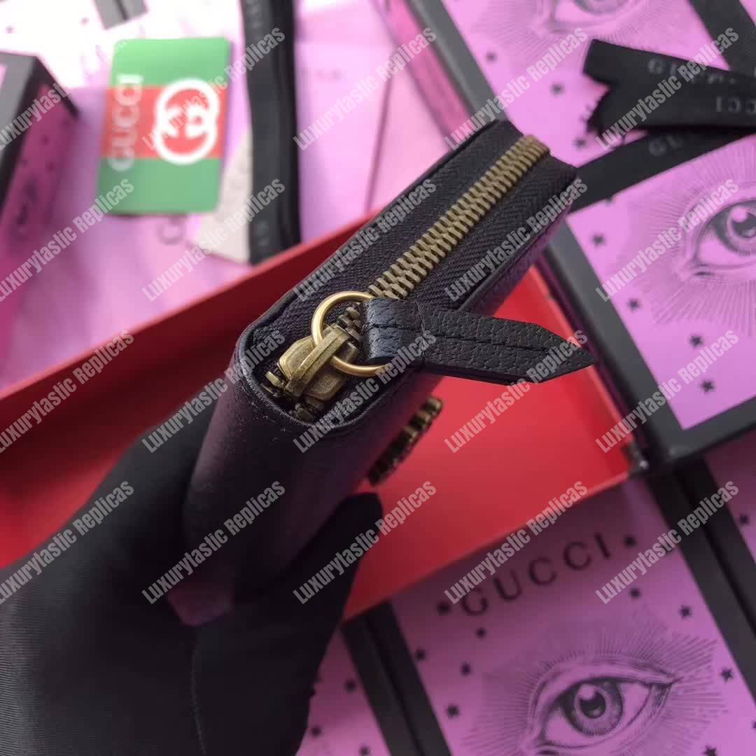 G*u*i leather zip around wallet black