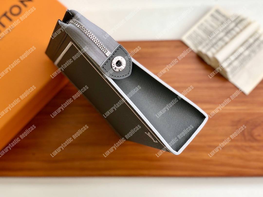 LV Pochette Voyage MM Taiga Leather Black