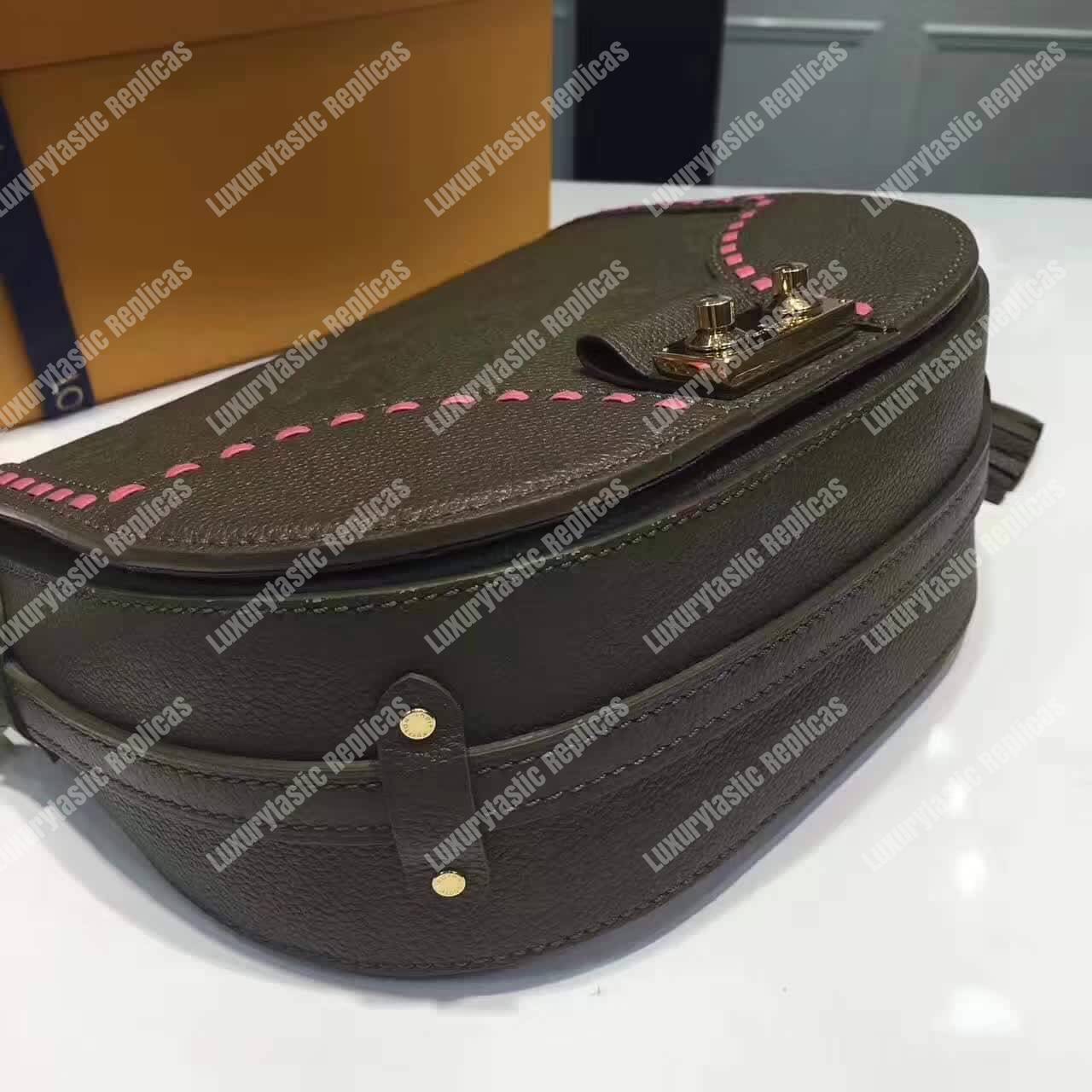 LV Junot Monogram Empreinte Leather