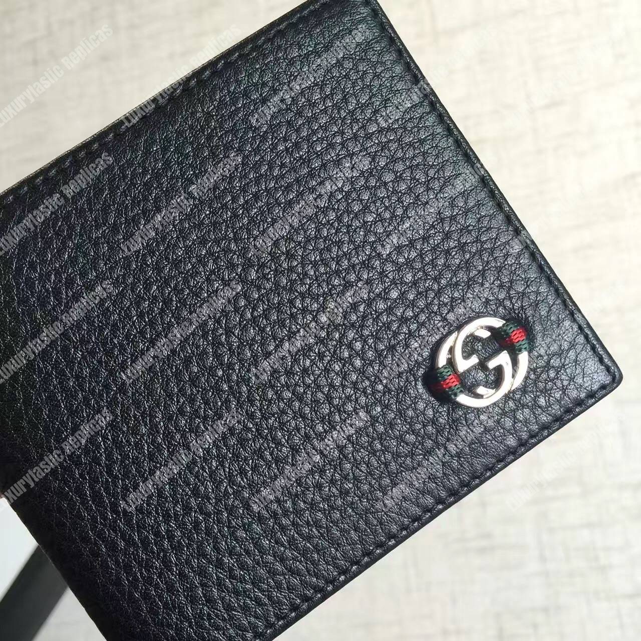 G*u*i leather bi-fold wallet black