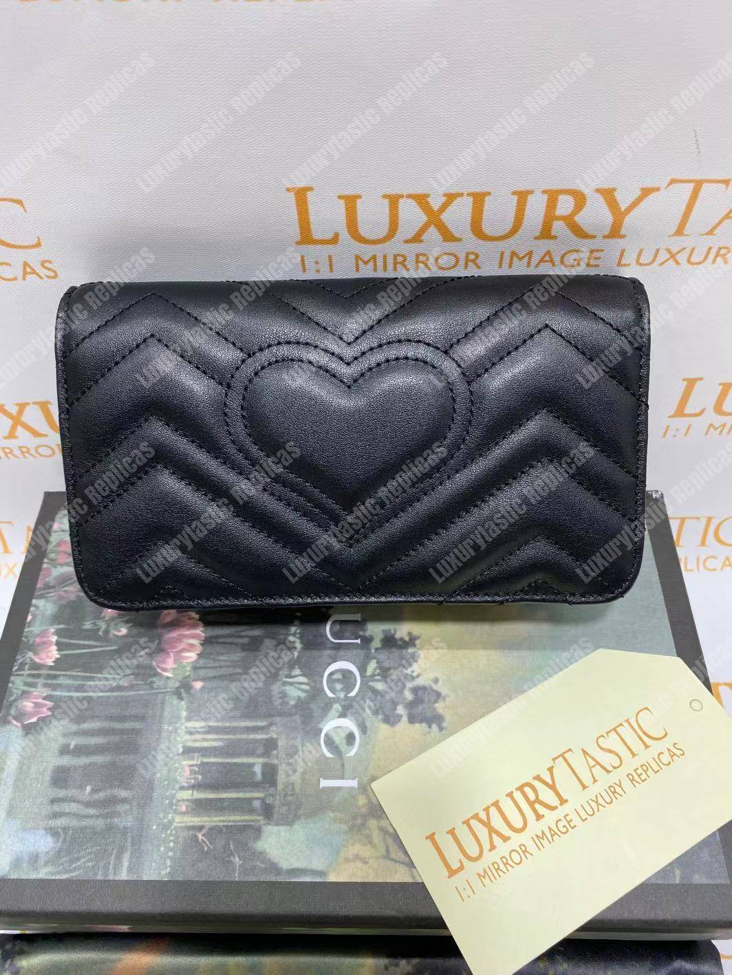 G*u*i gg marmont mini leather bag black