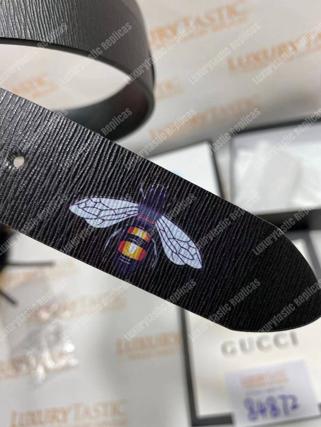 G*u*i leather belt with bee