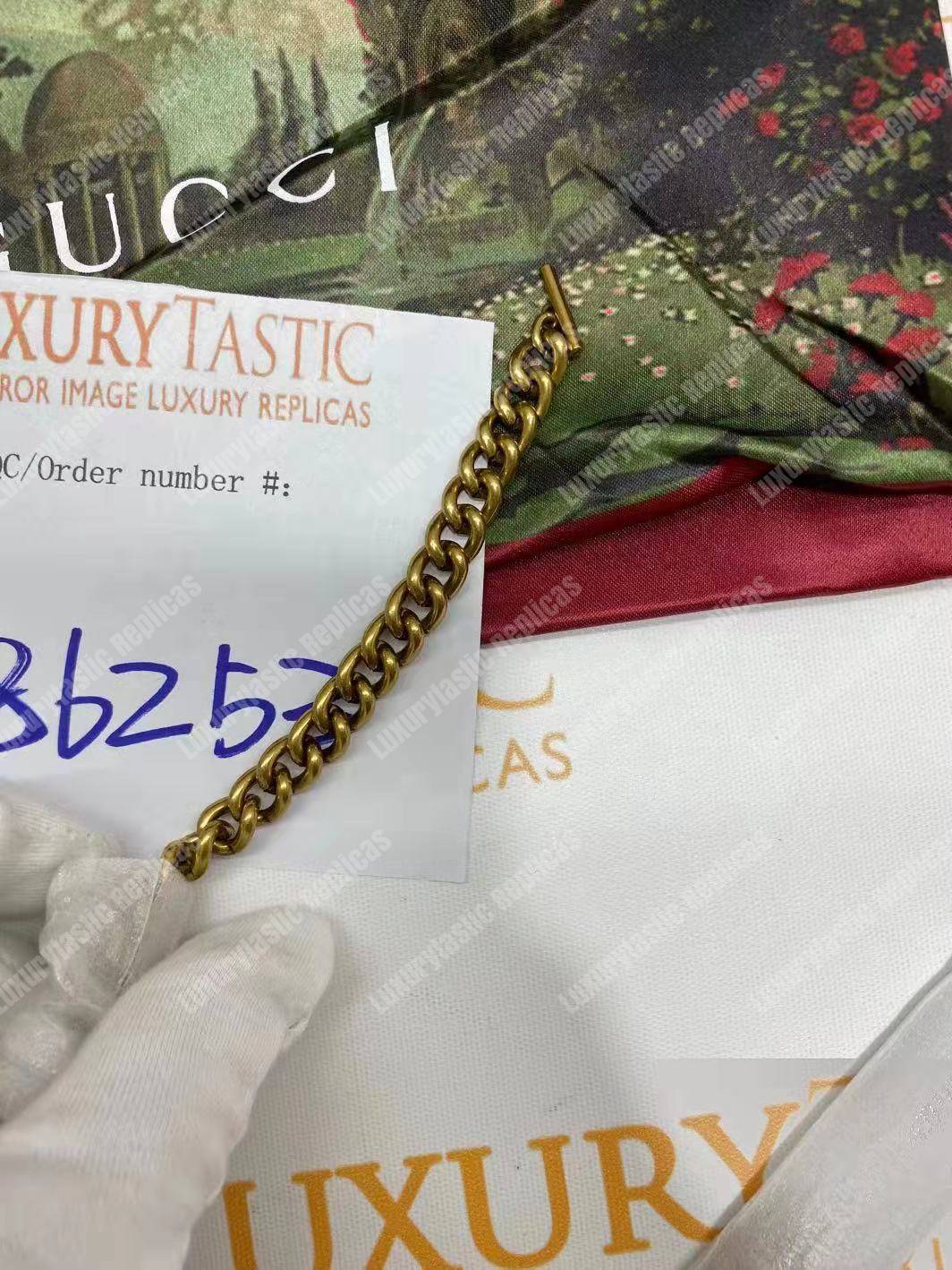 G*u*i dionysus leather small bag red