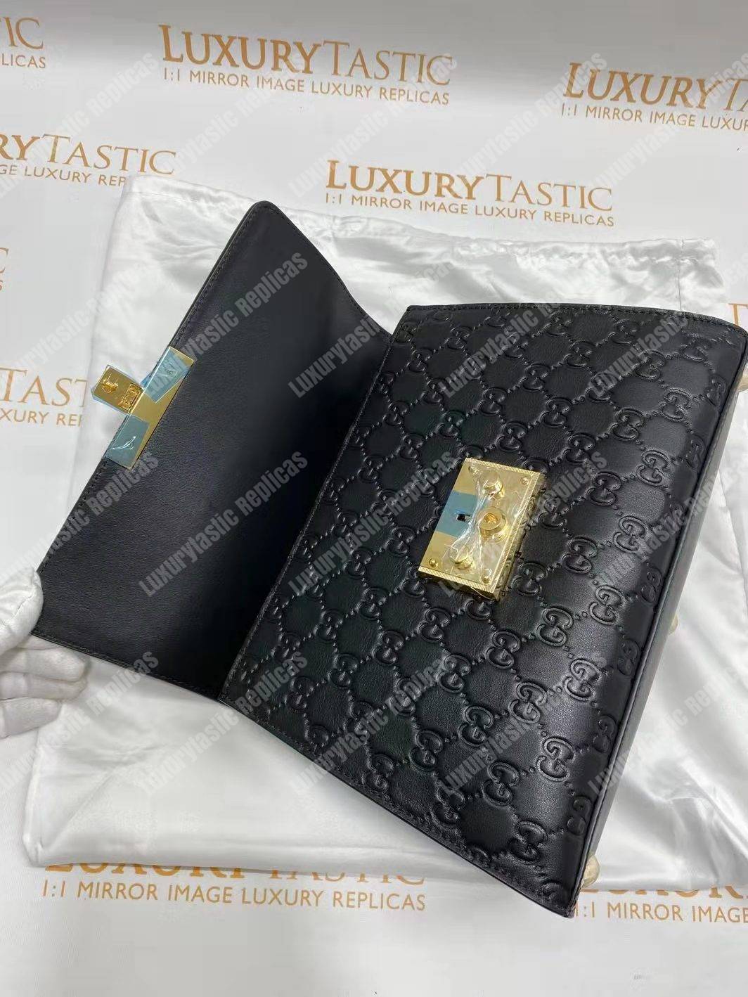 G*u*i padlock small signature top handle bag black