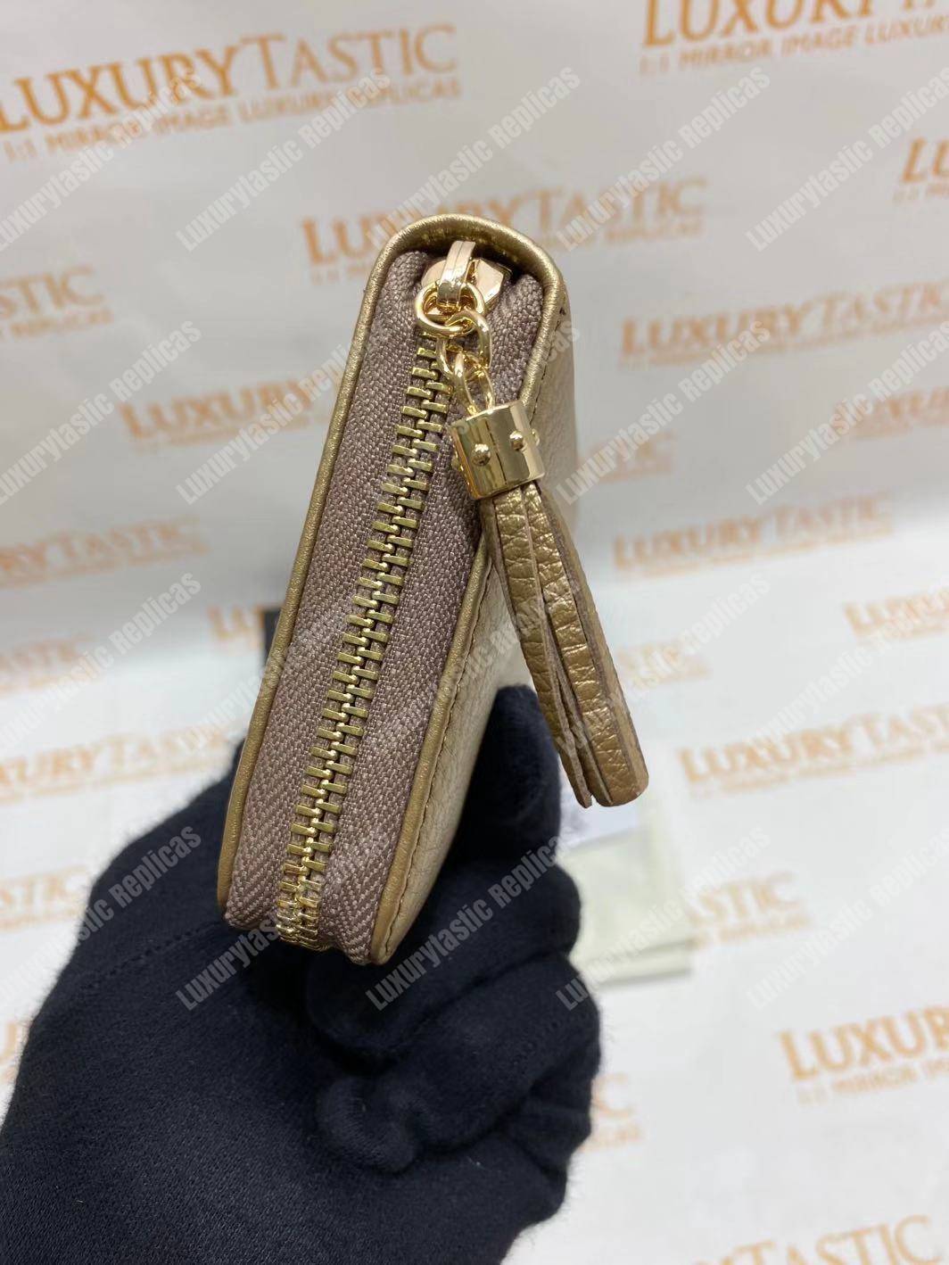 G*u*i soho zip around wallet gold