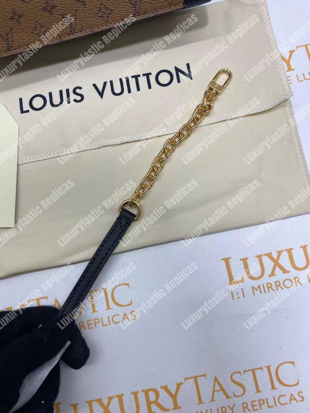 LV Trunk Clutch Monogram Reverse Canvas
