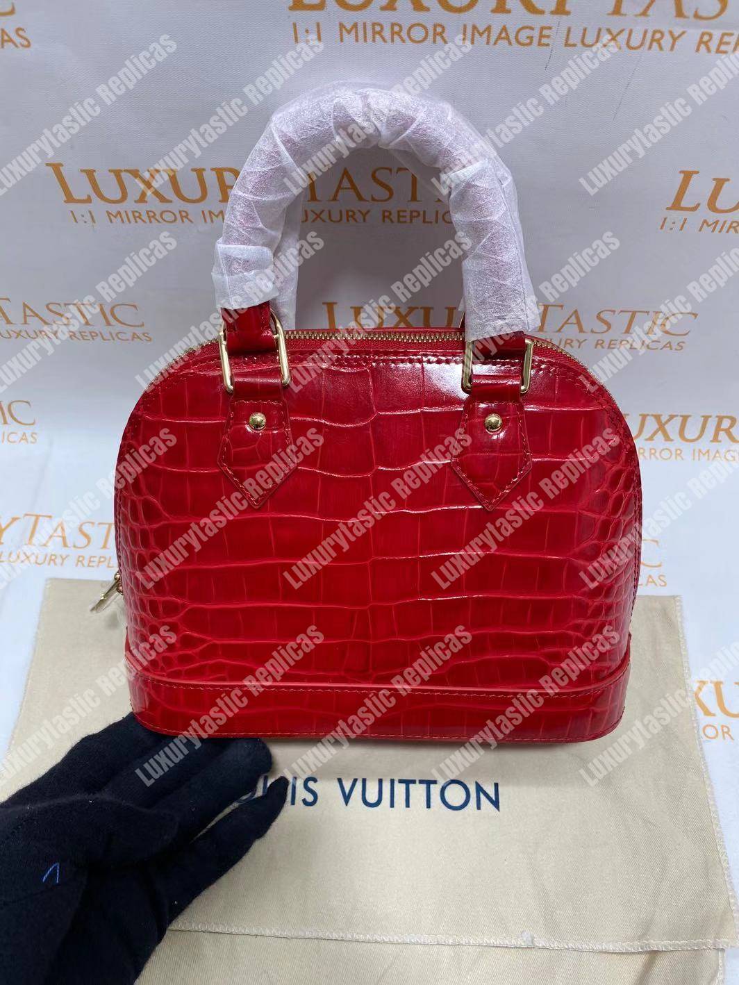 LV Alma BB Crocodilien Brillant Cerise
