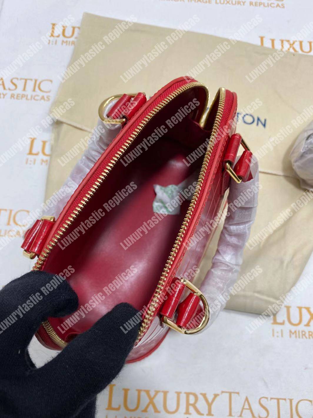 LV Alma BB Crocodilien Brillant Cerise