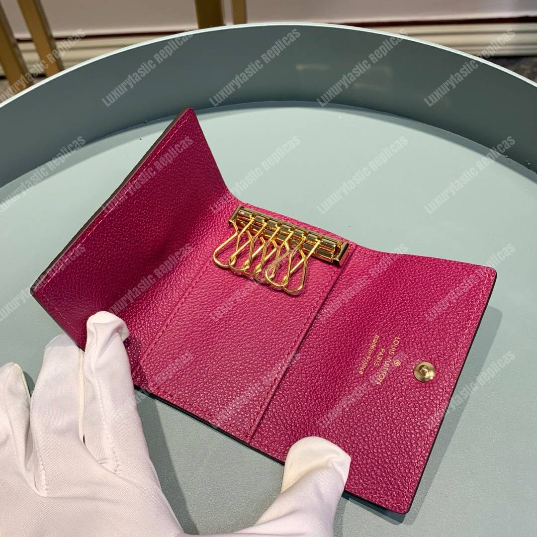 LV 6 KEY HOLDER Monogram Empreinte leather Fuchsia