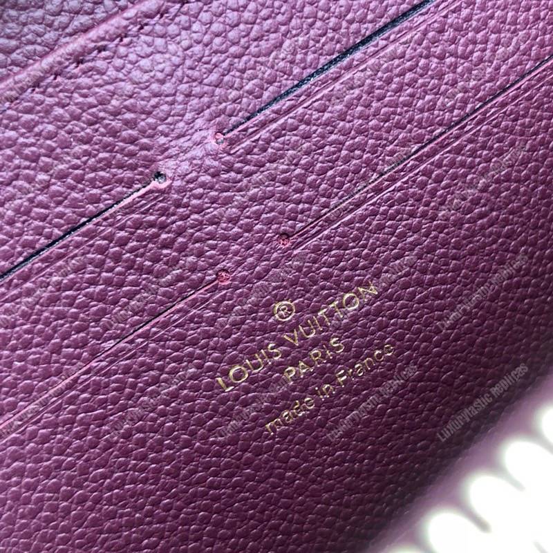 LV Clémence Wallet Monogram Empreinte Leather Raisin