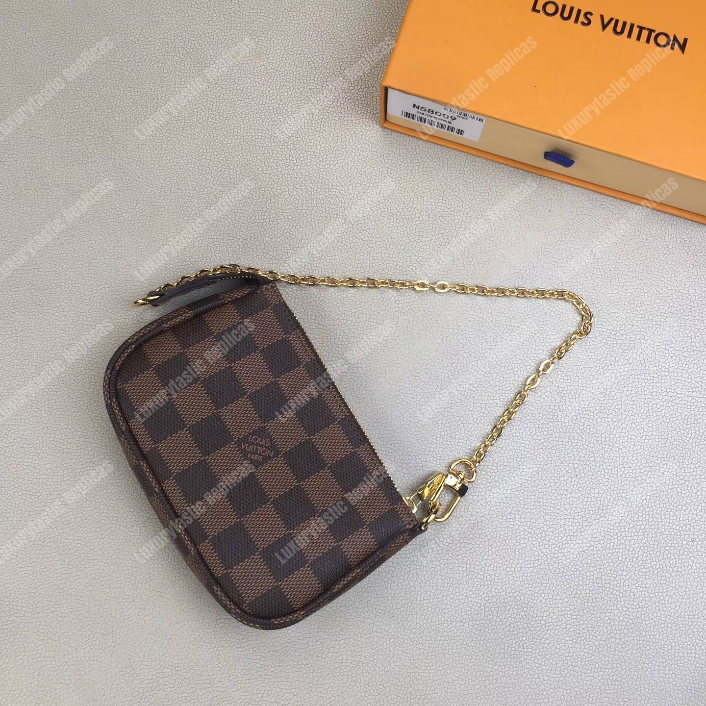 LV Mini Pochette Accessoires Damier Ebene
