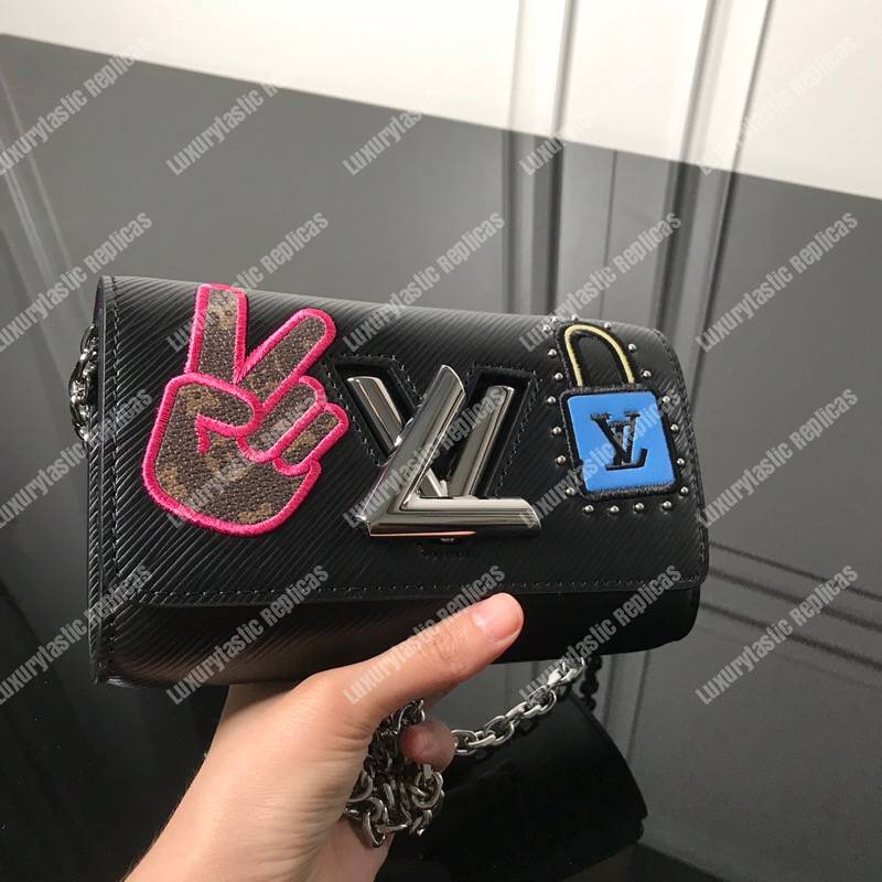 LV Twist Chain Wallet Epi Leather Travel and Trunk-Making Heritage Black