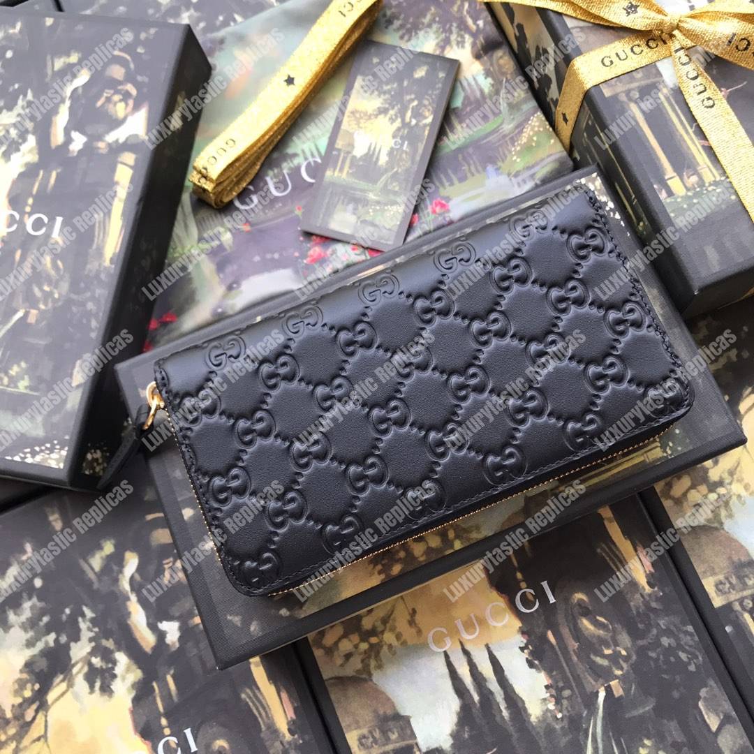 G*u*i signature zip around leather wallet black