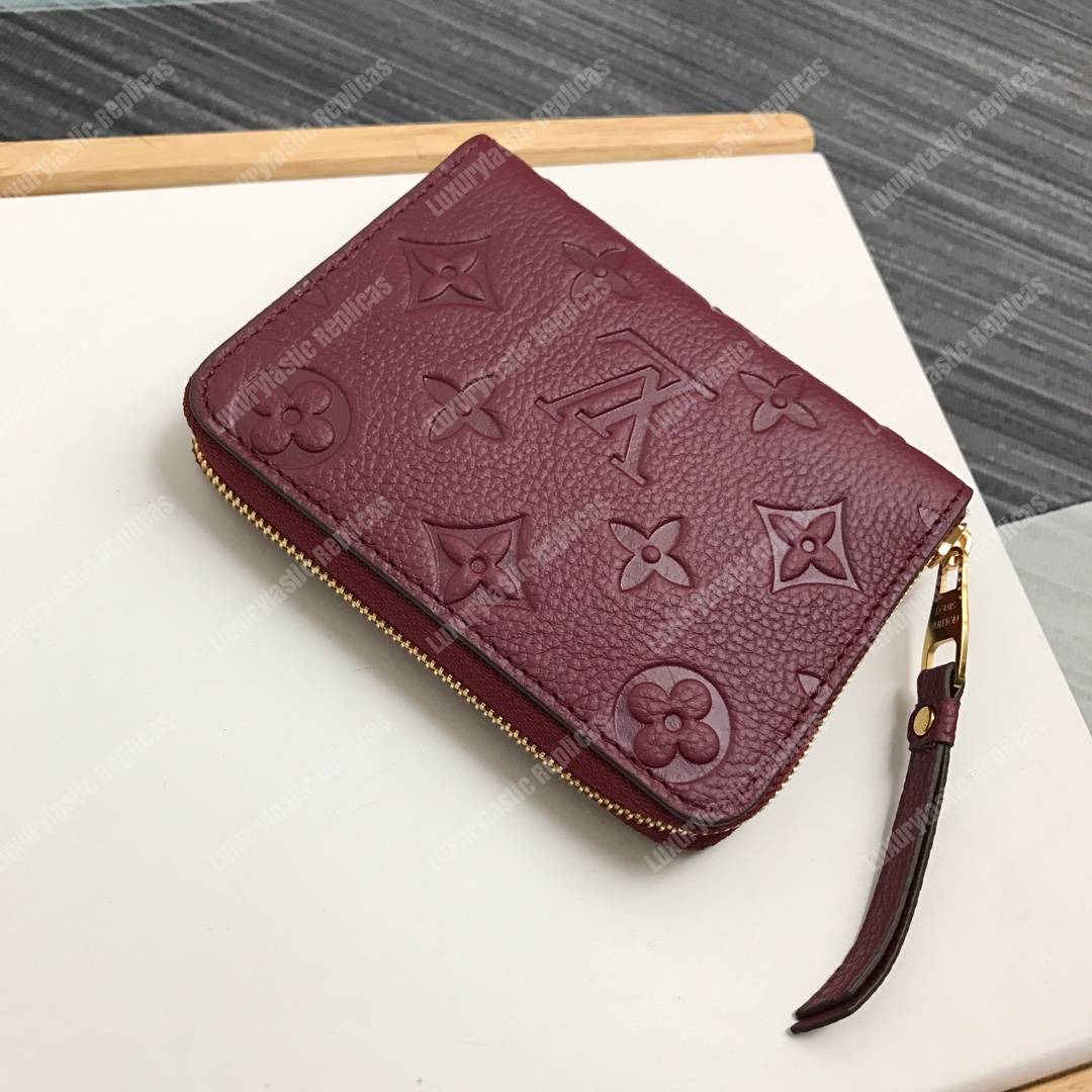 LV Zippy Coin Purse Monogram Empreinte Leather Aurore