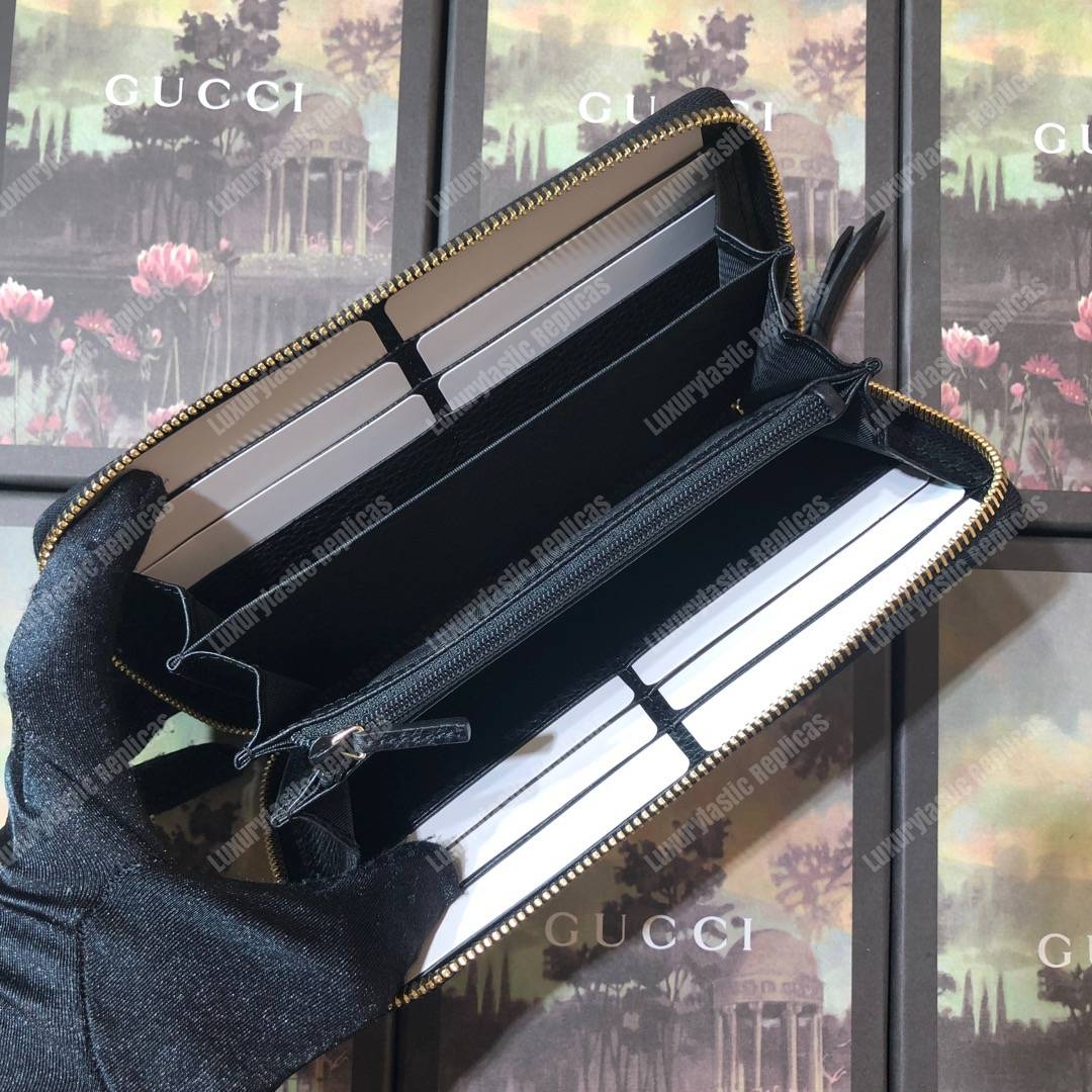 G*u*i leather zip around wallet black