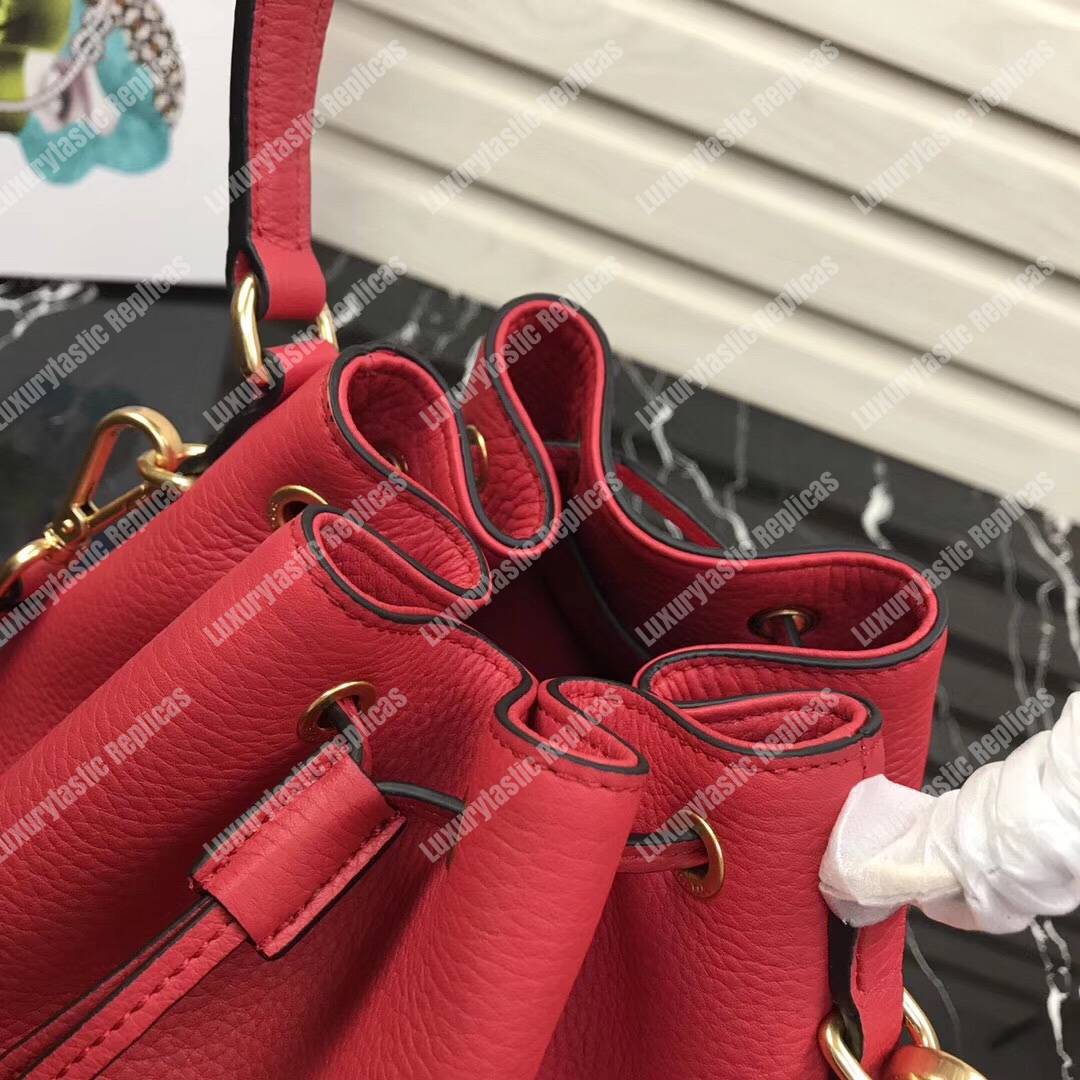Pra*a leather bucket bag red