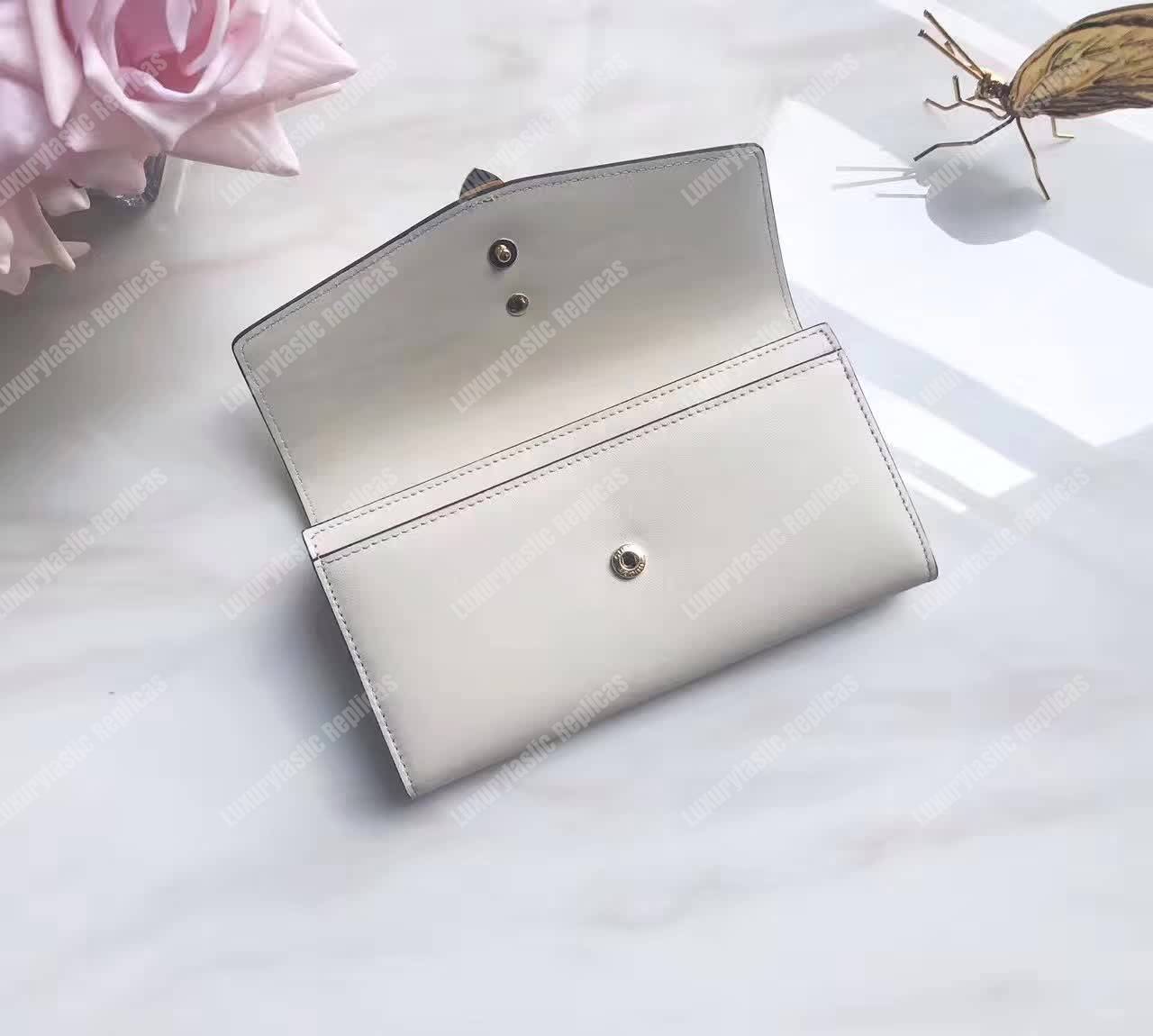 G*u*i sylvie leather continental wallet white