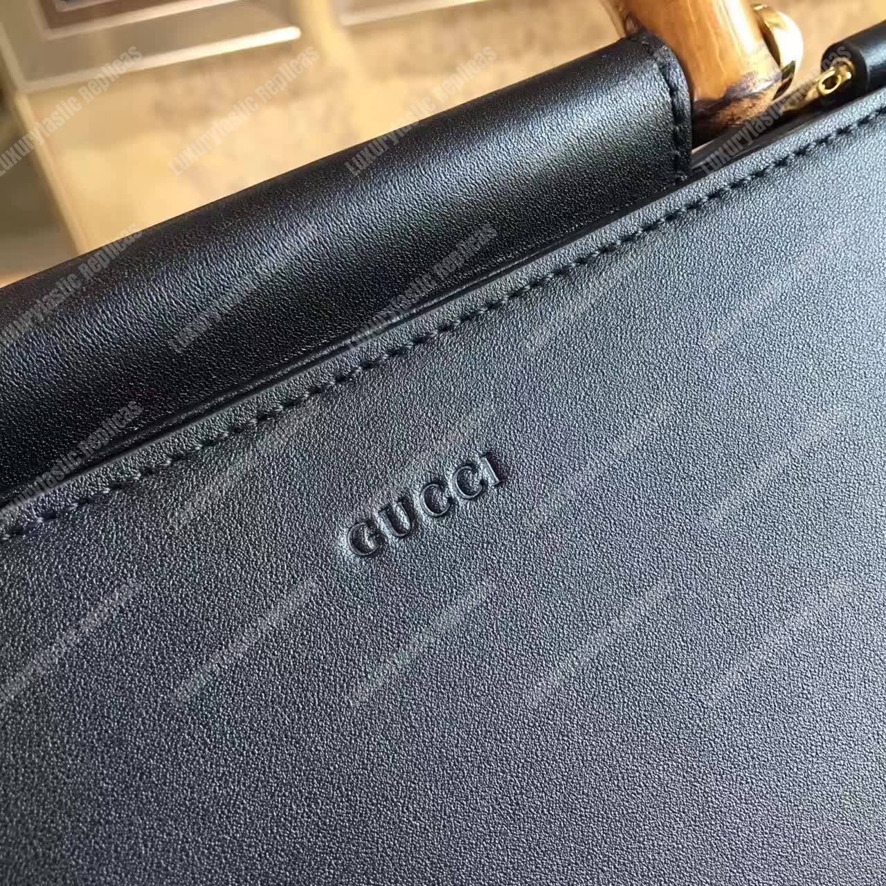 G*u*i nymphaea leather top handle bag