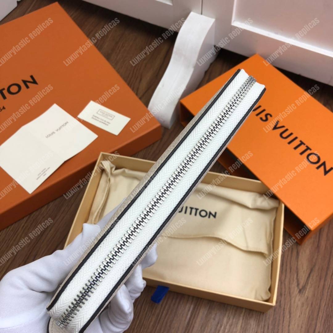 LV Zippy Wallet Mahina Leather Ivory