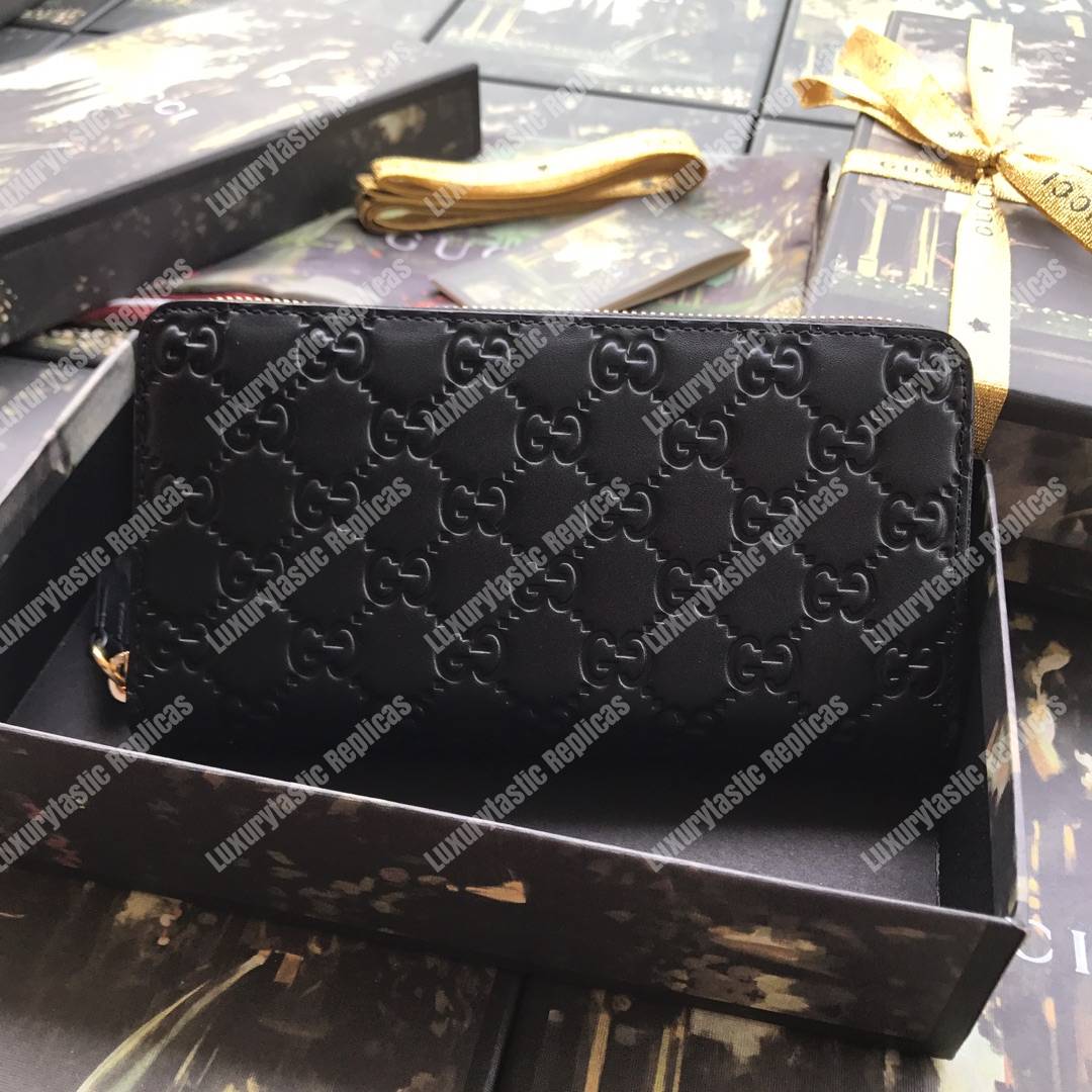 G*u*i signature zip around leather wallet black
