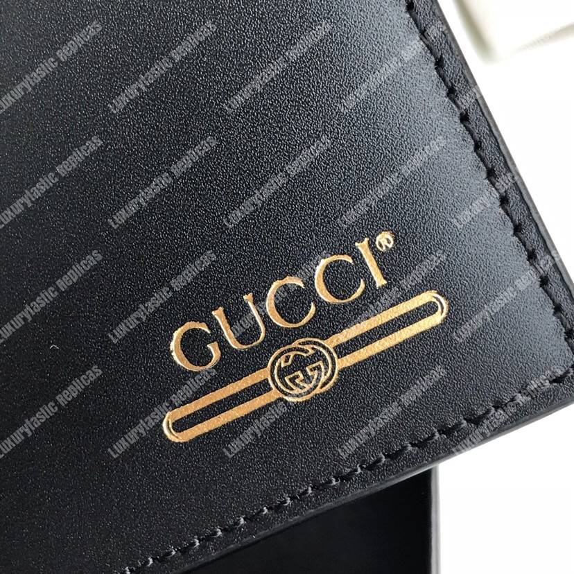 G*u*i leather wallet with G*u*i logo