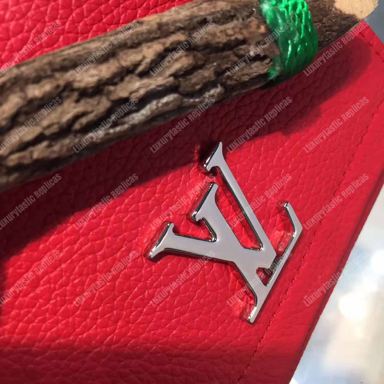 LV LockMe II Compact Wallet Taurillon Leather Rubis