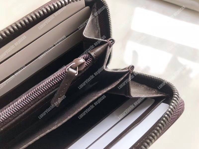 G*u*i gg sup*e zip around wallet with web