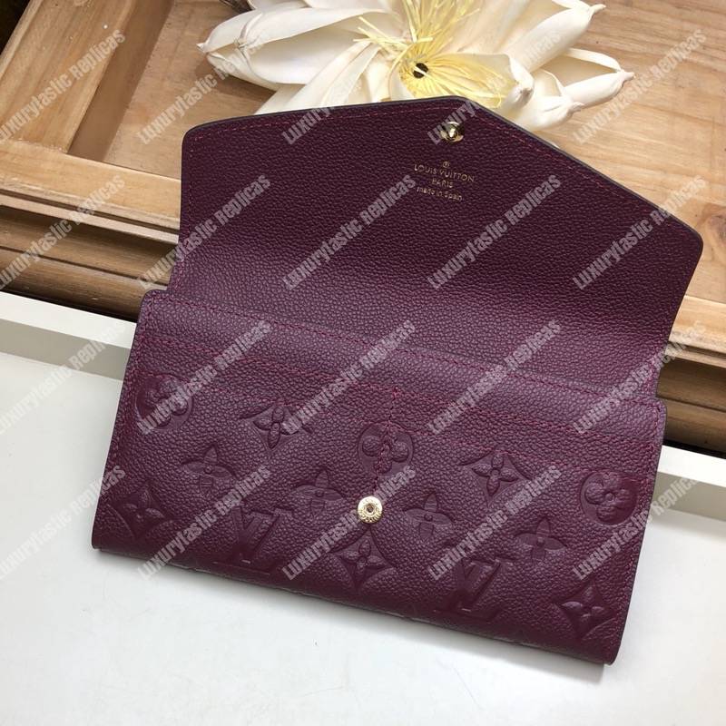LV Sarah Wallet Monogram Empreinte Leather Raisin Purple